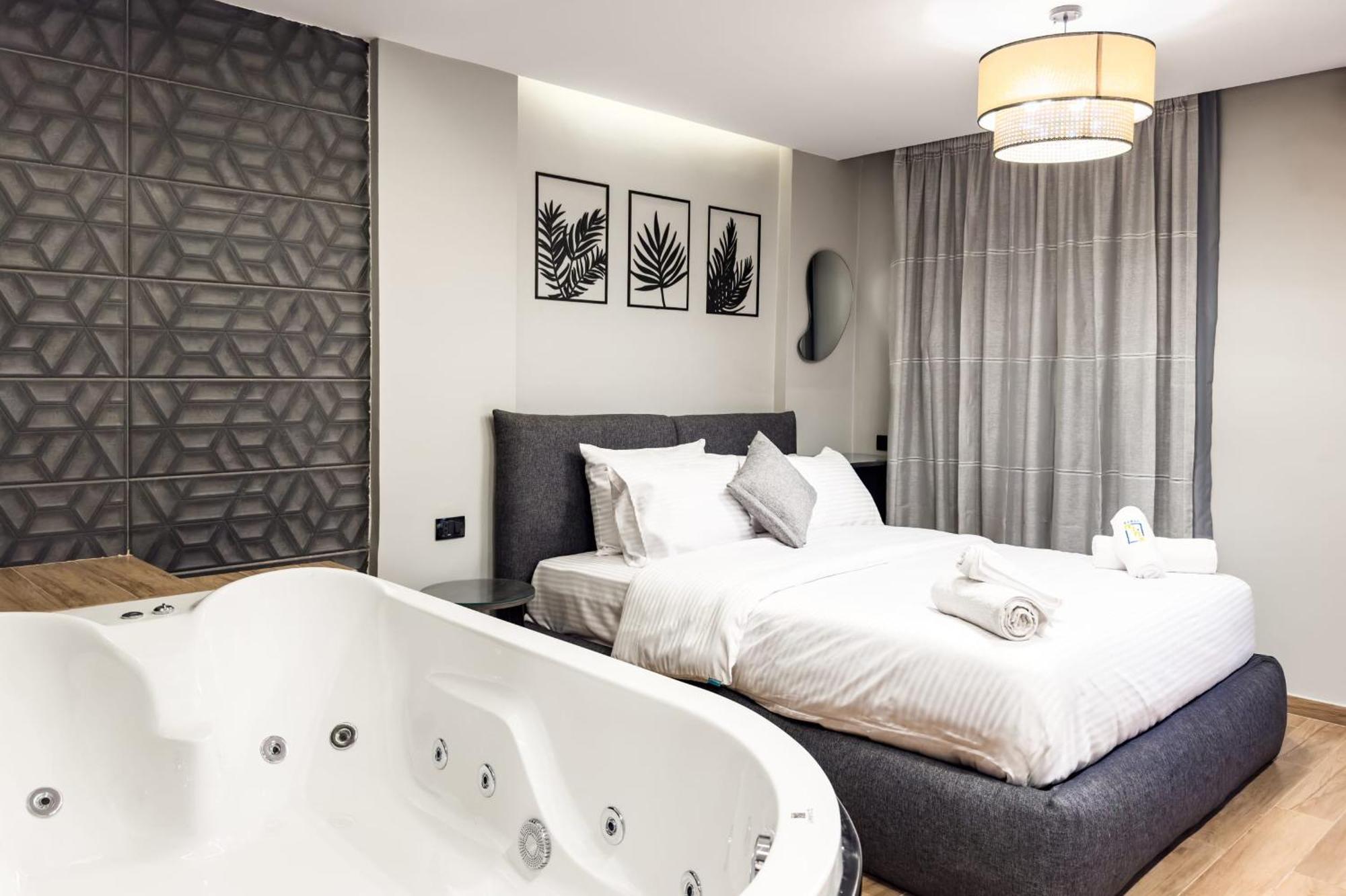 The 1bdr Slate Space W Jacuzzi 5min To Cai Airport דירה